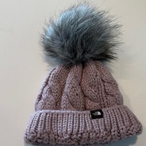 The North Face Pink Cable Knit Beanie with Gray Pom-Pom